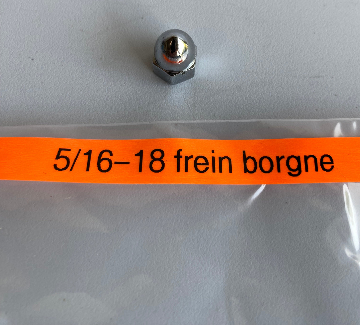 Ecrou borgne chromé freiné 5/16-18 Harley Davidson OEM