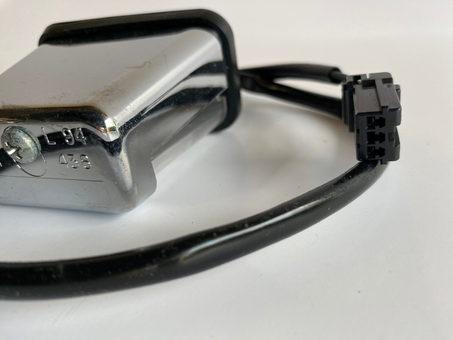 Eclairage de plaque immatriculation chrome Harley Davidson REF OEM 68180-99