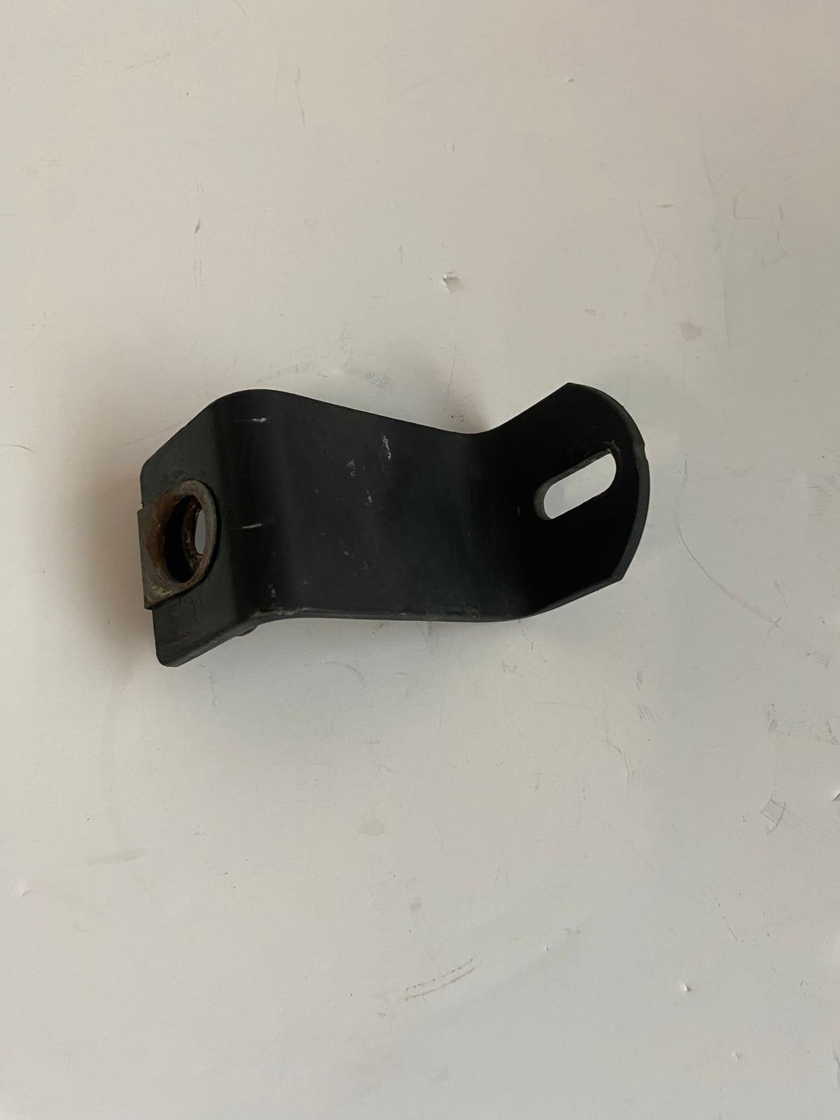 Patte de fixation arrière de sacoches Touring Harley Davidson REF OEM 90801-95