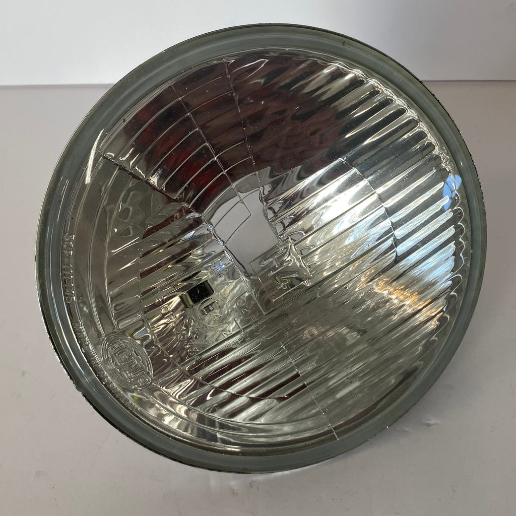 Optique de phare Hella 7 pouces Harley Davidson REF MCS 908165