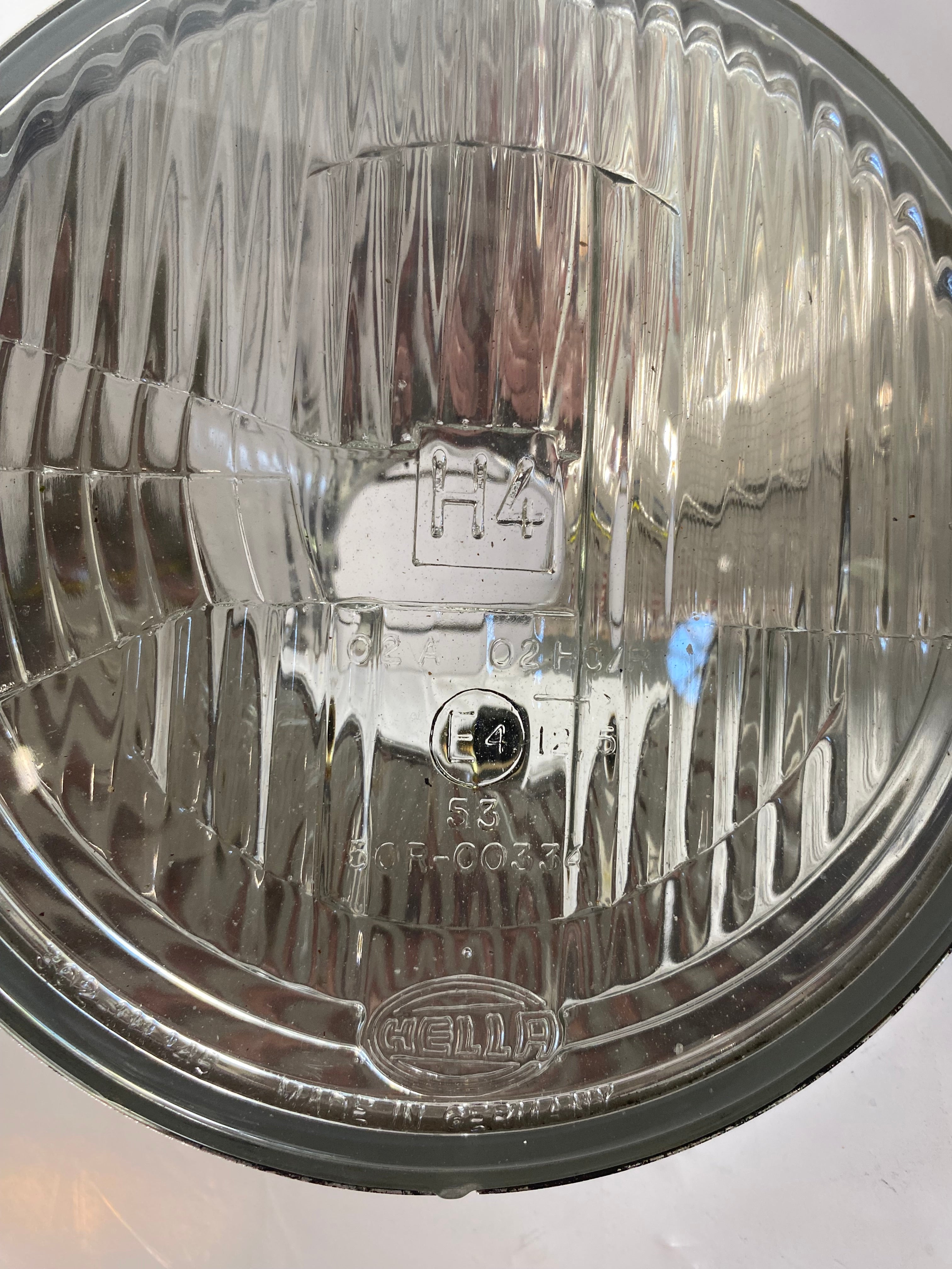 Optique de phare Hella 7 pouces Harley Davidson REF MCS 908165