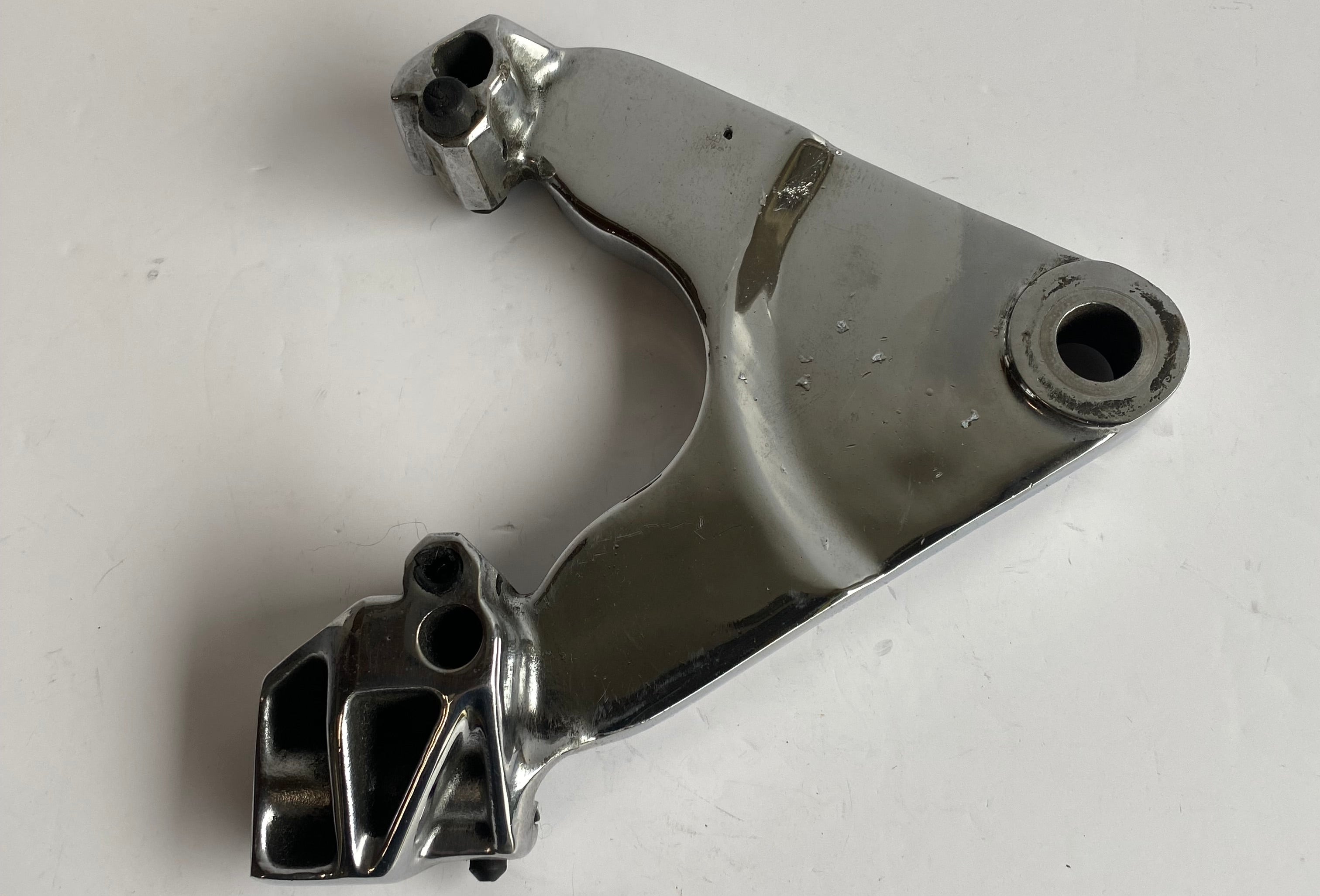 Support étrier de frein arrière chromé Softail 1340 Harley Davidson REF OEM 44207-87