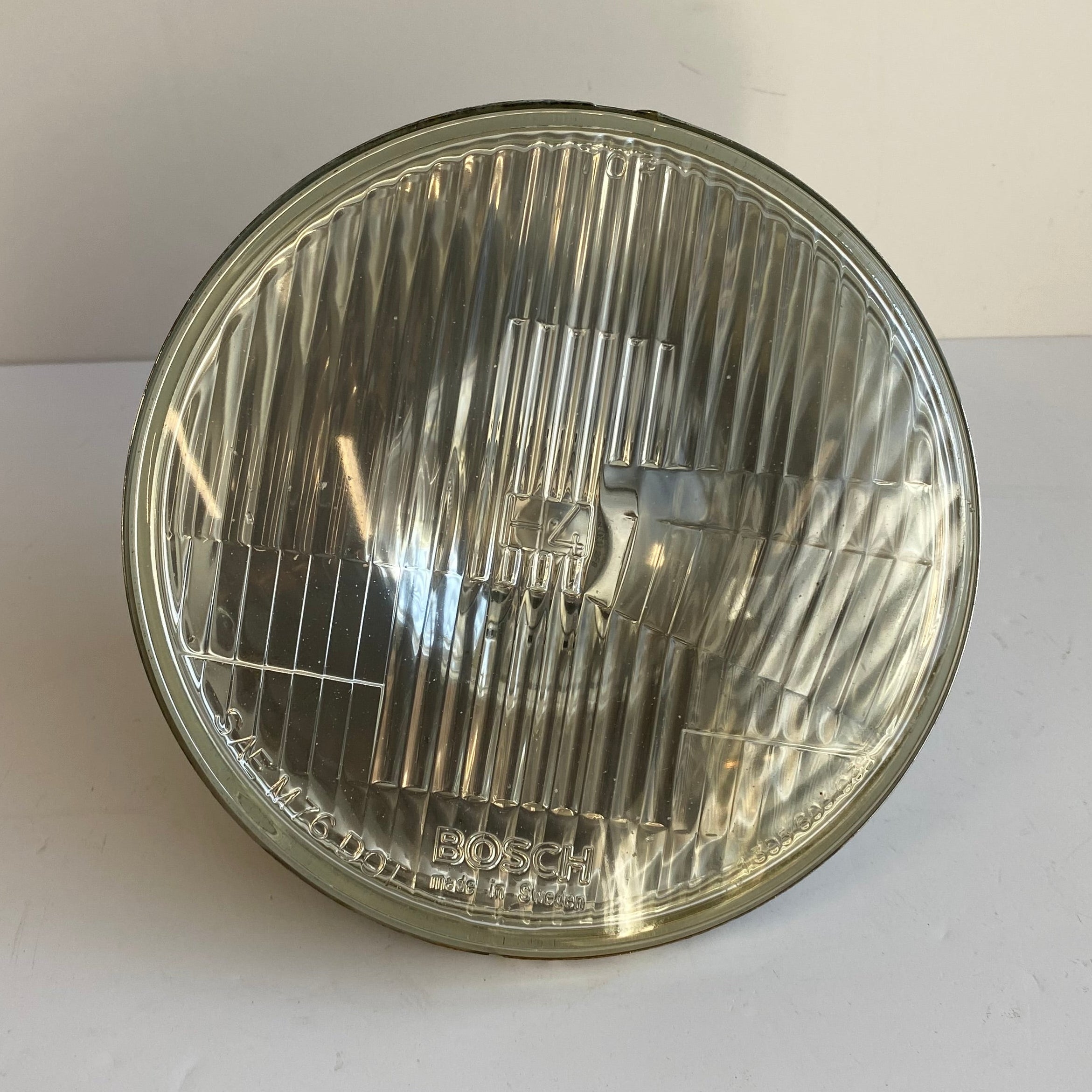Optique de phare 7 pouces H4 Bosch Harley Davidson REF OEM 67702-81C