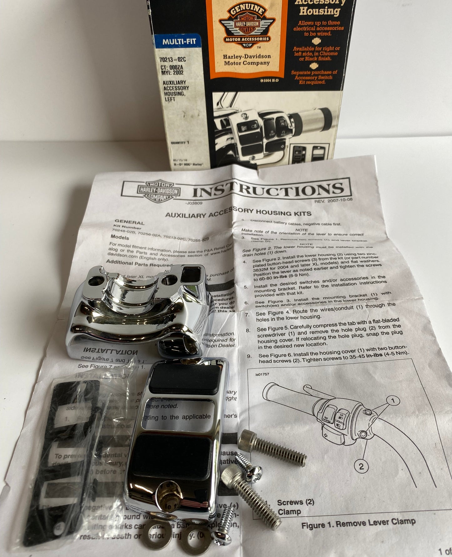 Boitier boutons auxiliaires chrome coté gauche Harley Davidson REF 70213-02C
