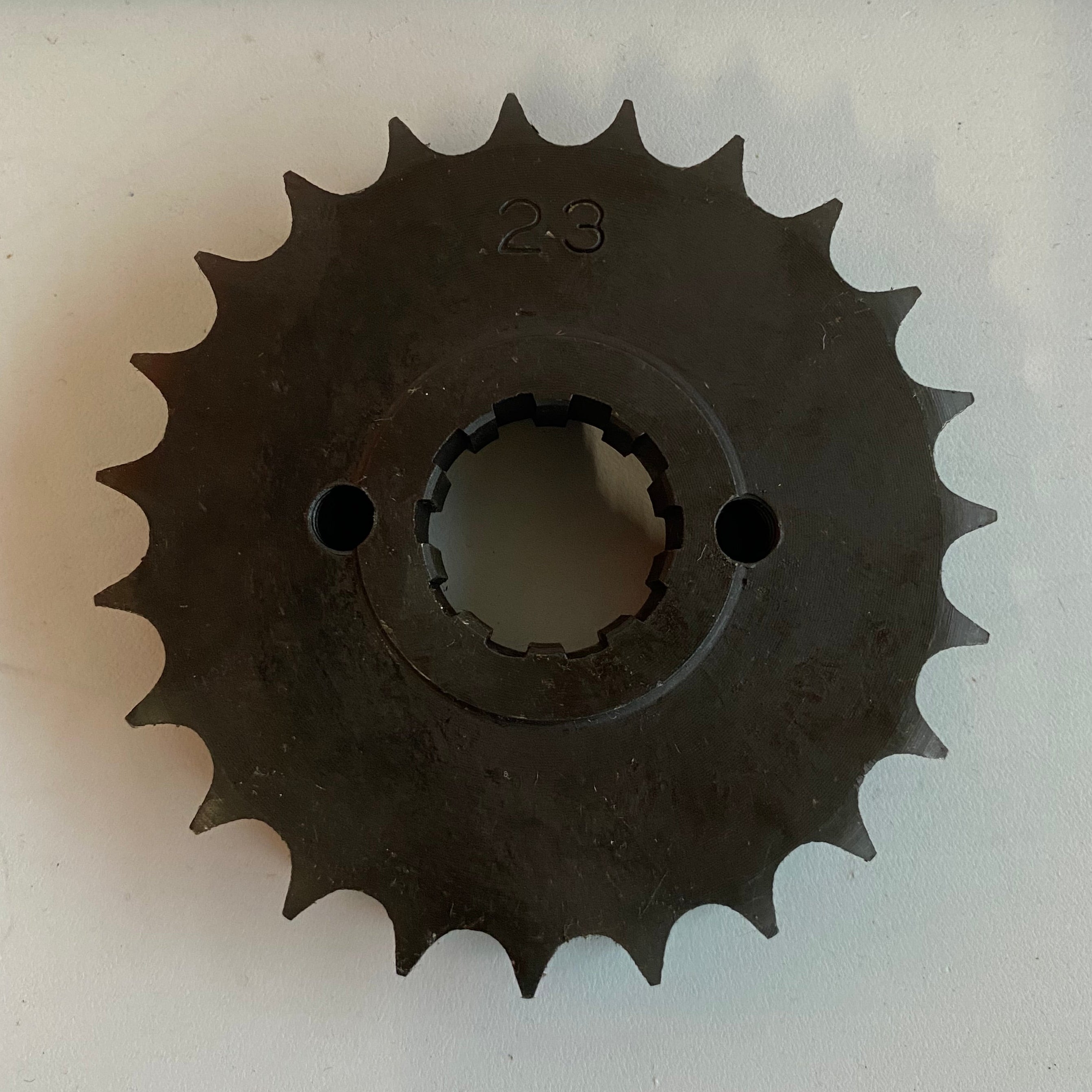 Pignon 23 dents sortie vilebrequin Harley Davidson REF OEM 40210-55