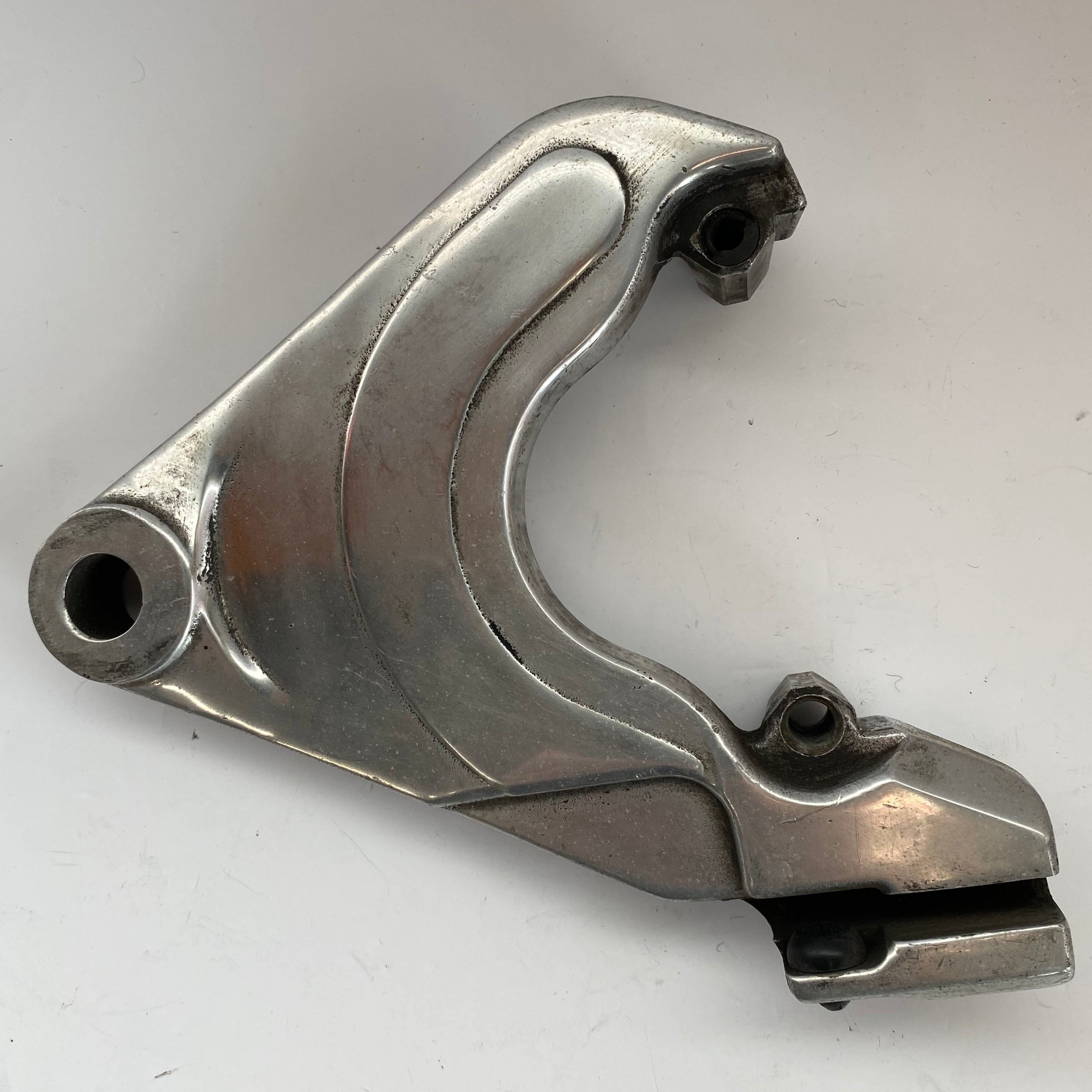 Support d'étrier de frein arrière Harley Davidson Softail REF OEM  44207-87