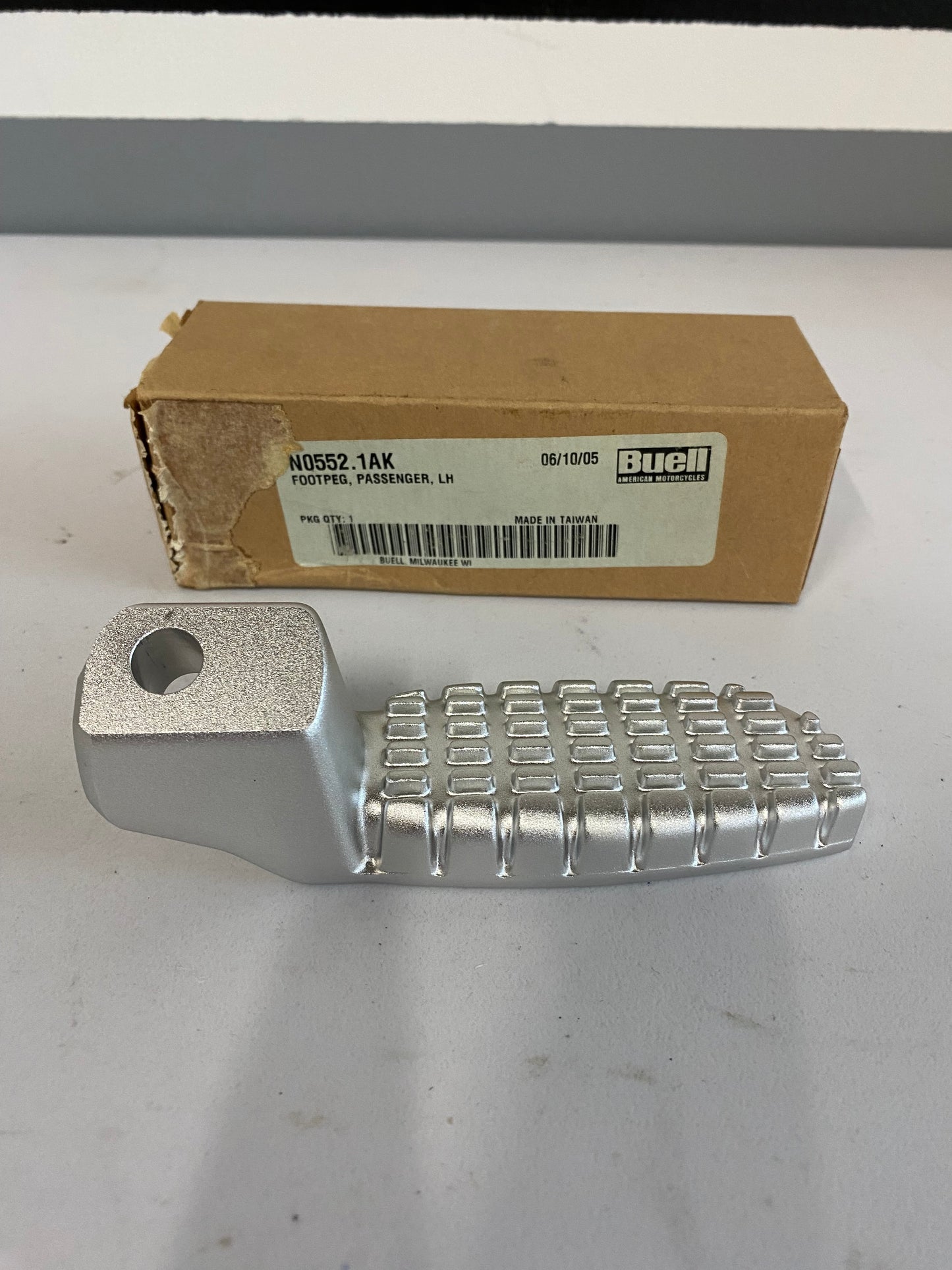 Cale pied passager gauche BUELL REF OEM : N0552.1AK
