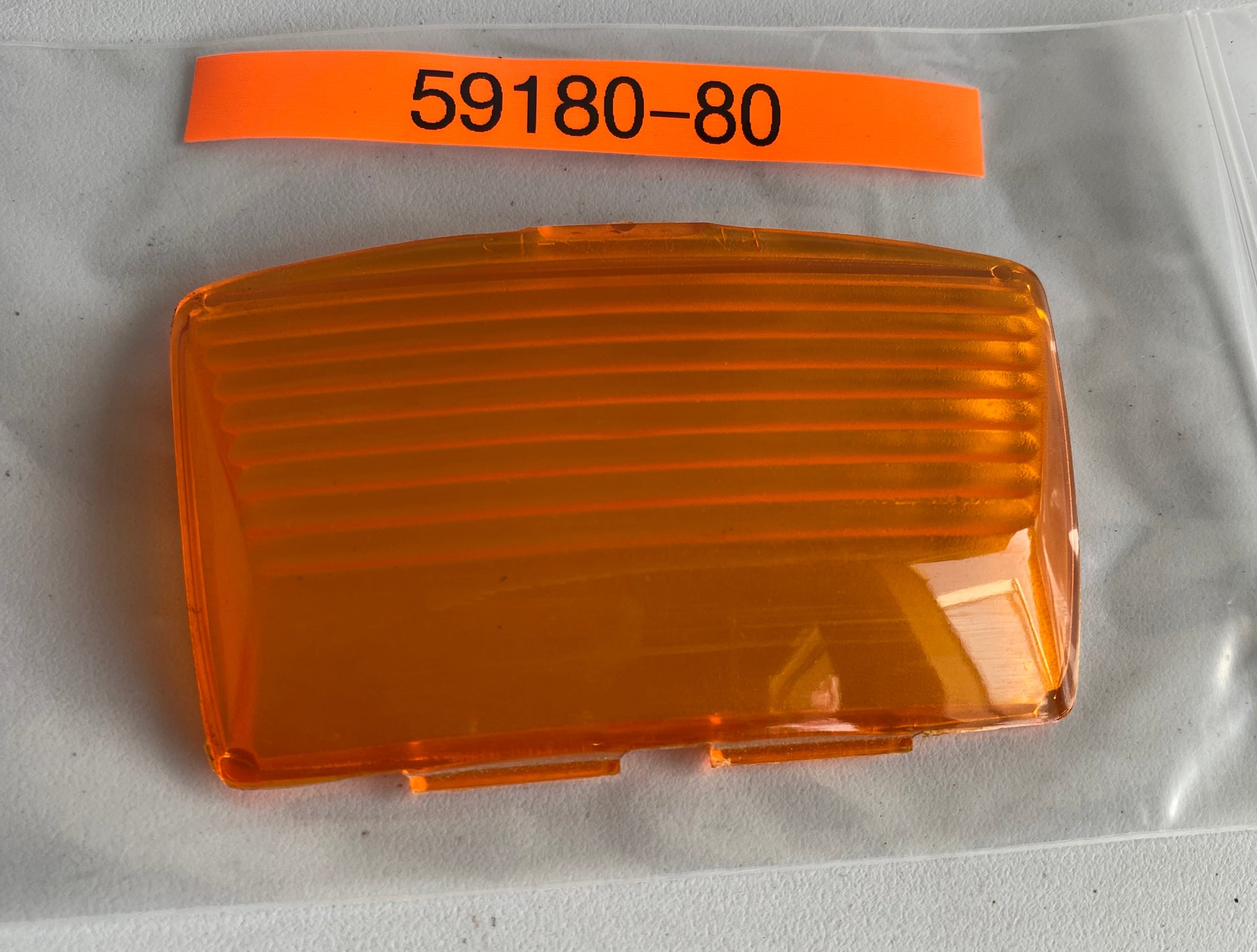 Cabochon d'éclairage de garde boue avant Harley Davidson REF OEM 59180-80
