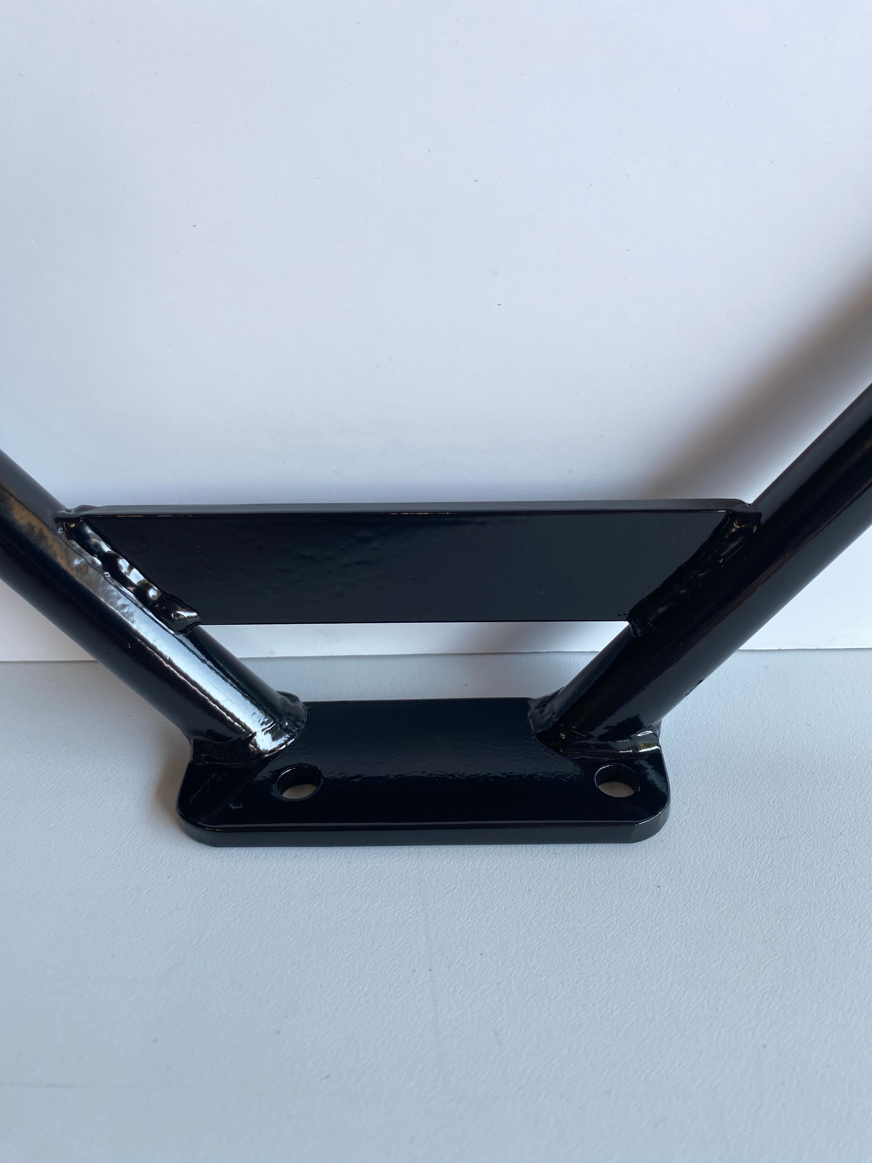 Support noir de cales pieds passager pour cadre rigide Harley Davidson REF MCS : 519470