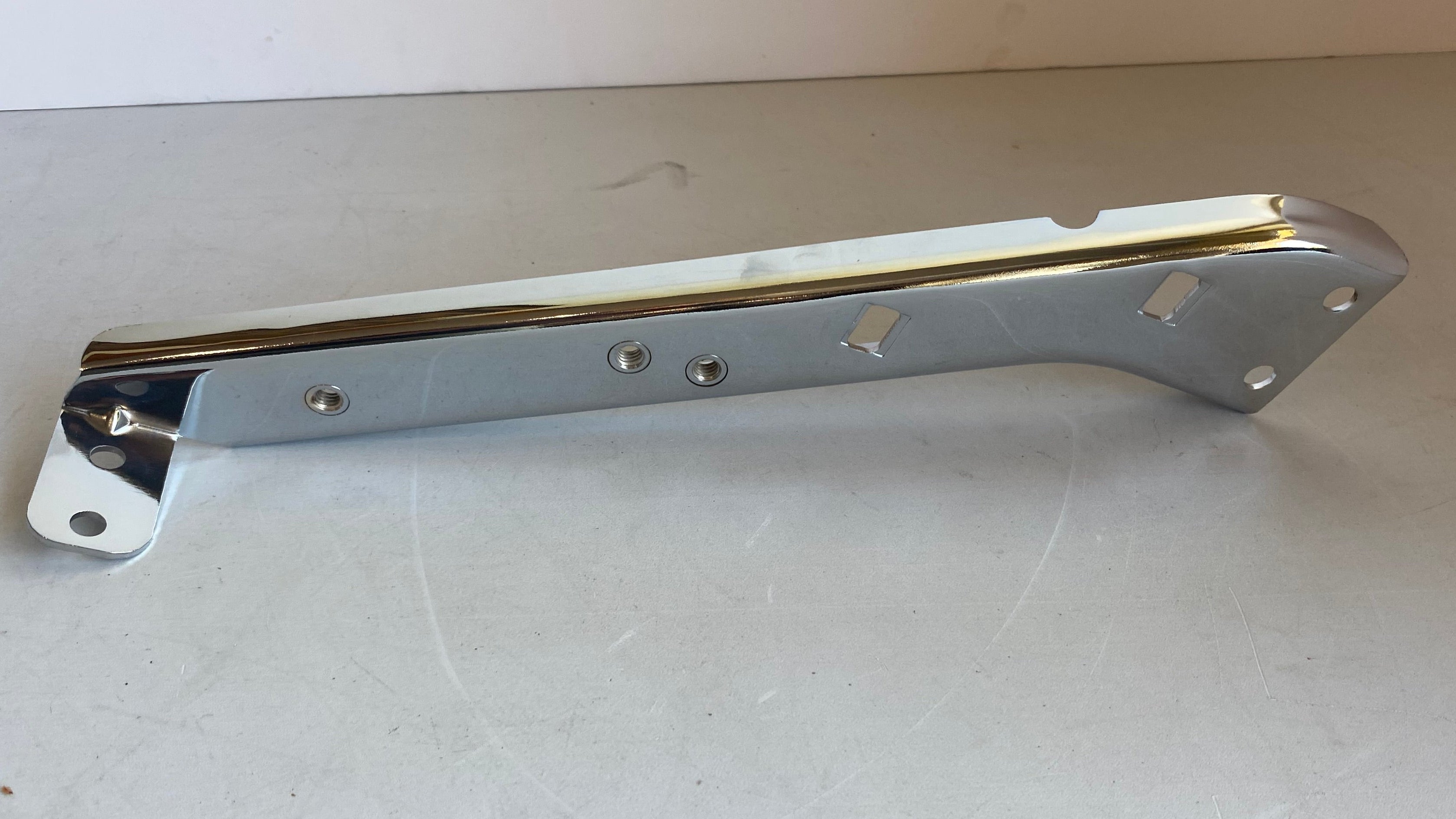 Support de sacoche/silencieux chromé gauche Touring Harley Davidson REF OEM 90718-79C