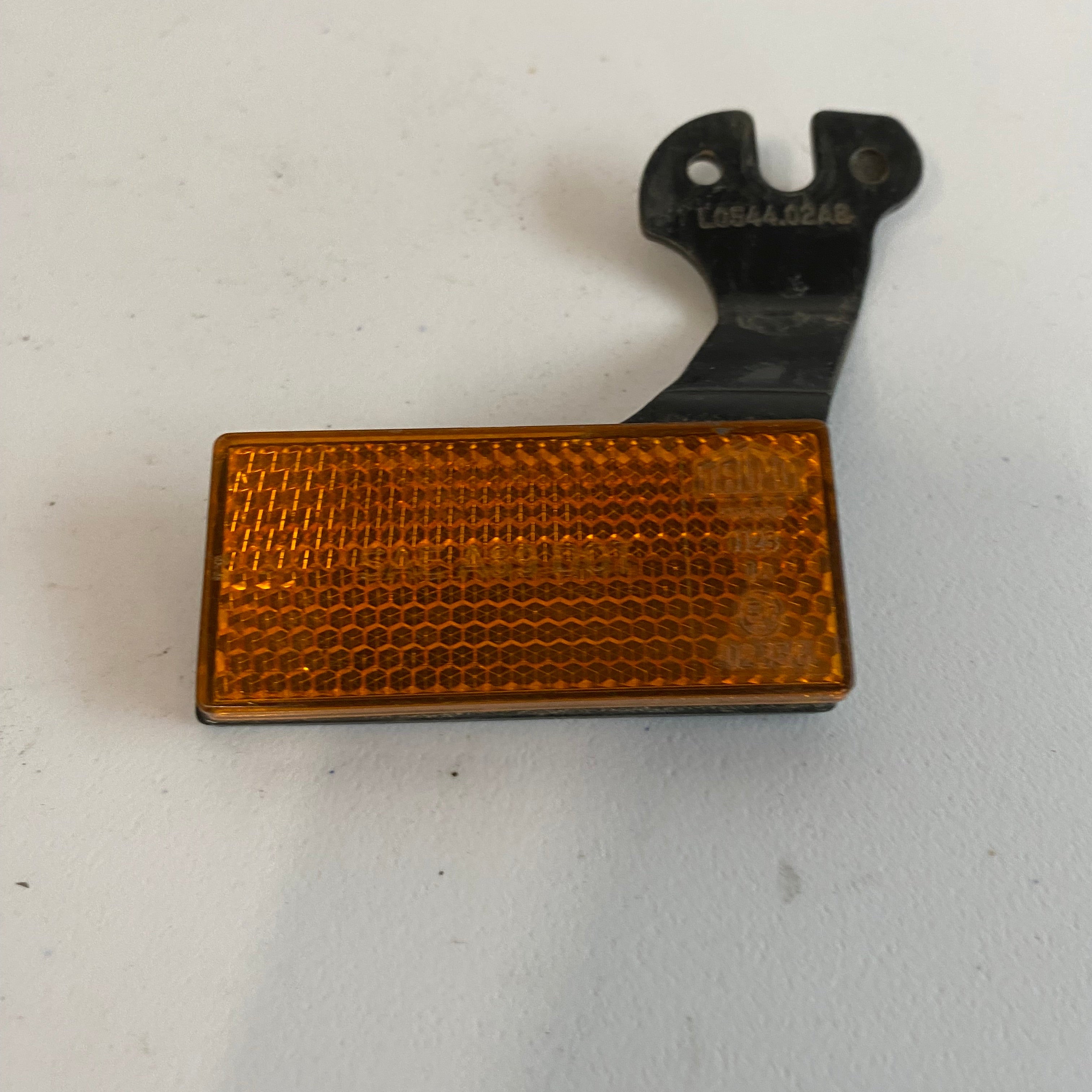 BUELL Left Rear Reflector and Bracket OEM REF: L0554.02A8