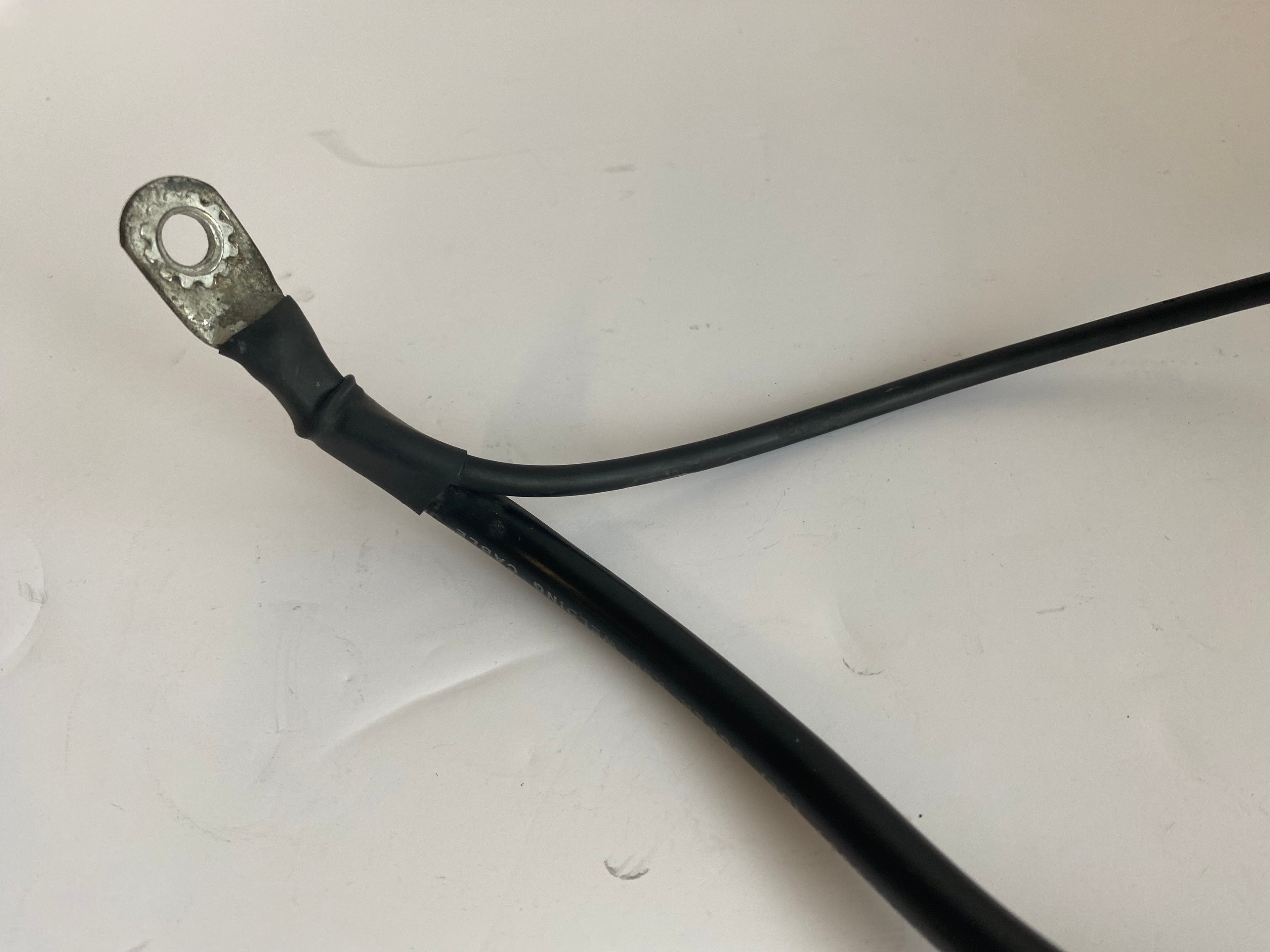 Cable de batterie négatif Dyna Harley Davidson REF OEM 70284-06A