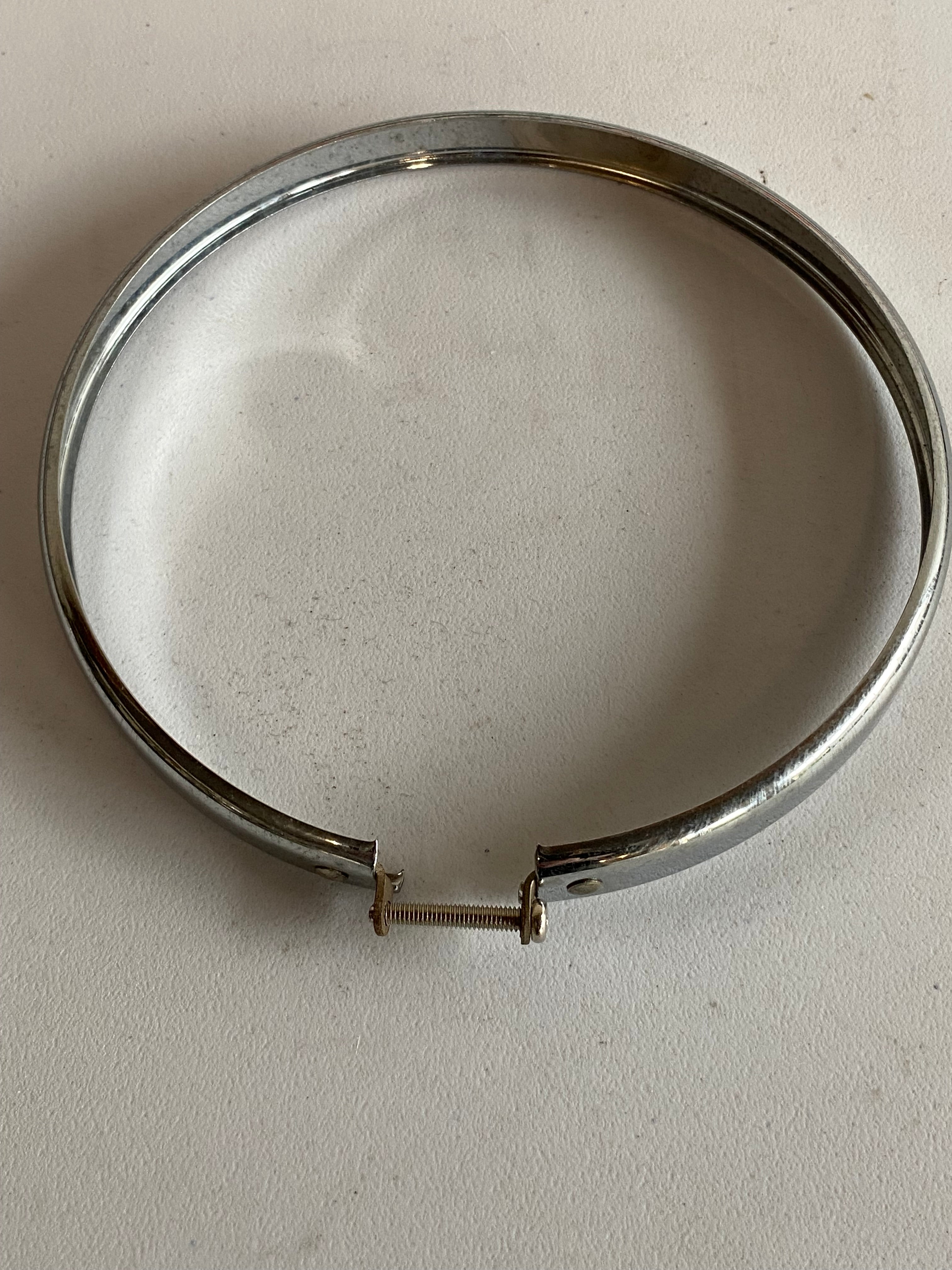Harley Davidson 5 3/4 inch Headlight Half Bezel OEM REF: 67744-75