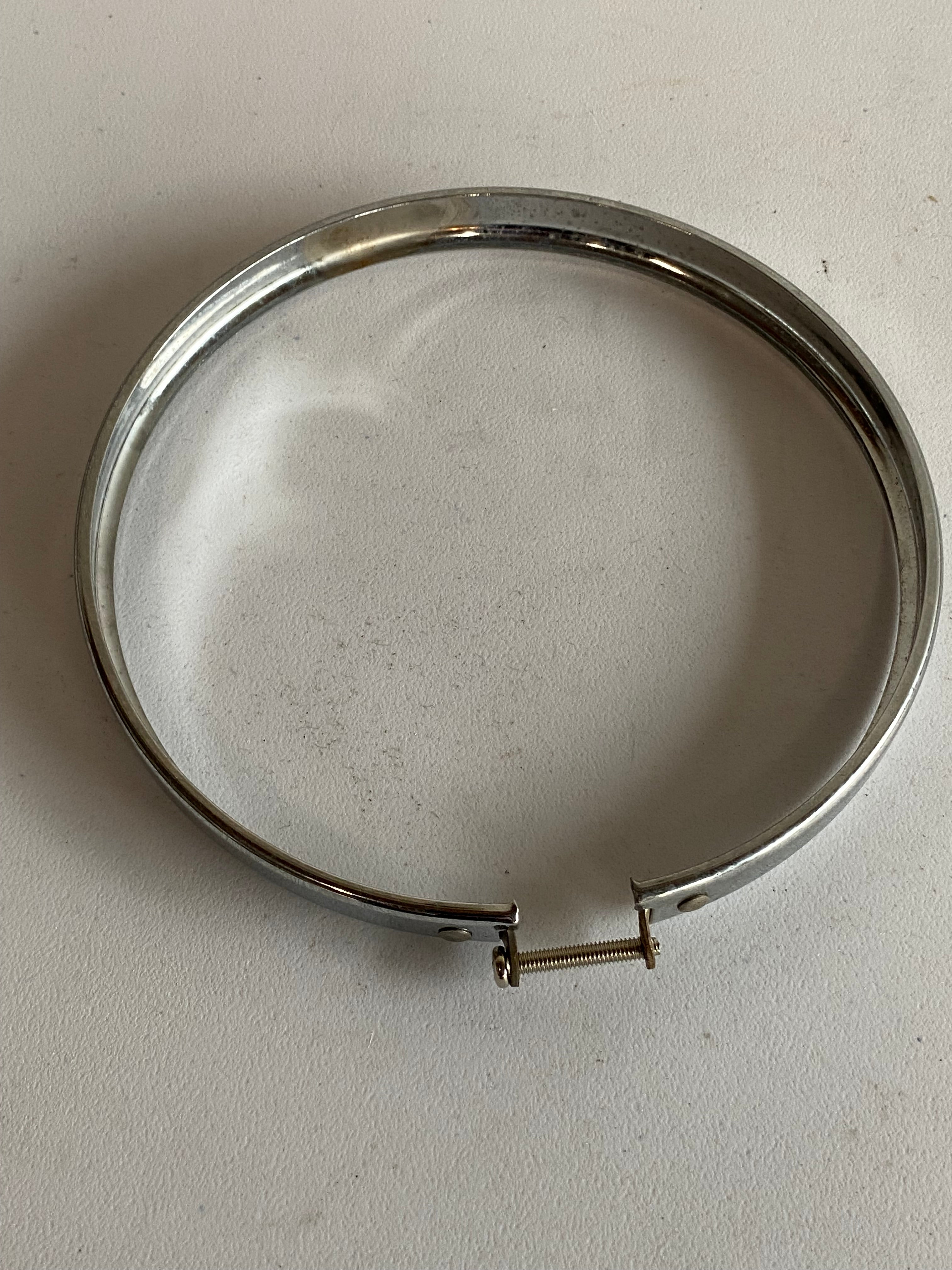 Harley Davidson 5 3/4 inch Headlight Half Bezel OEM REF: 67744-75