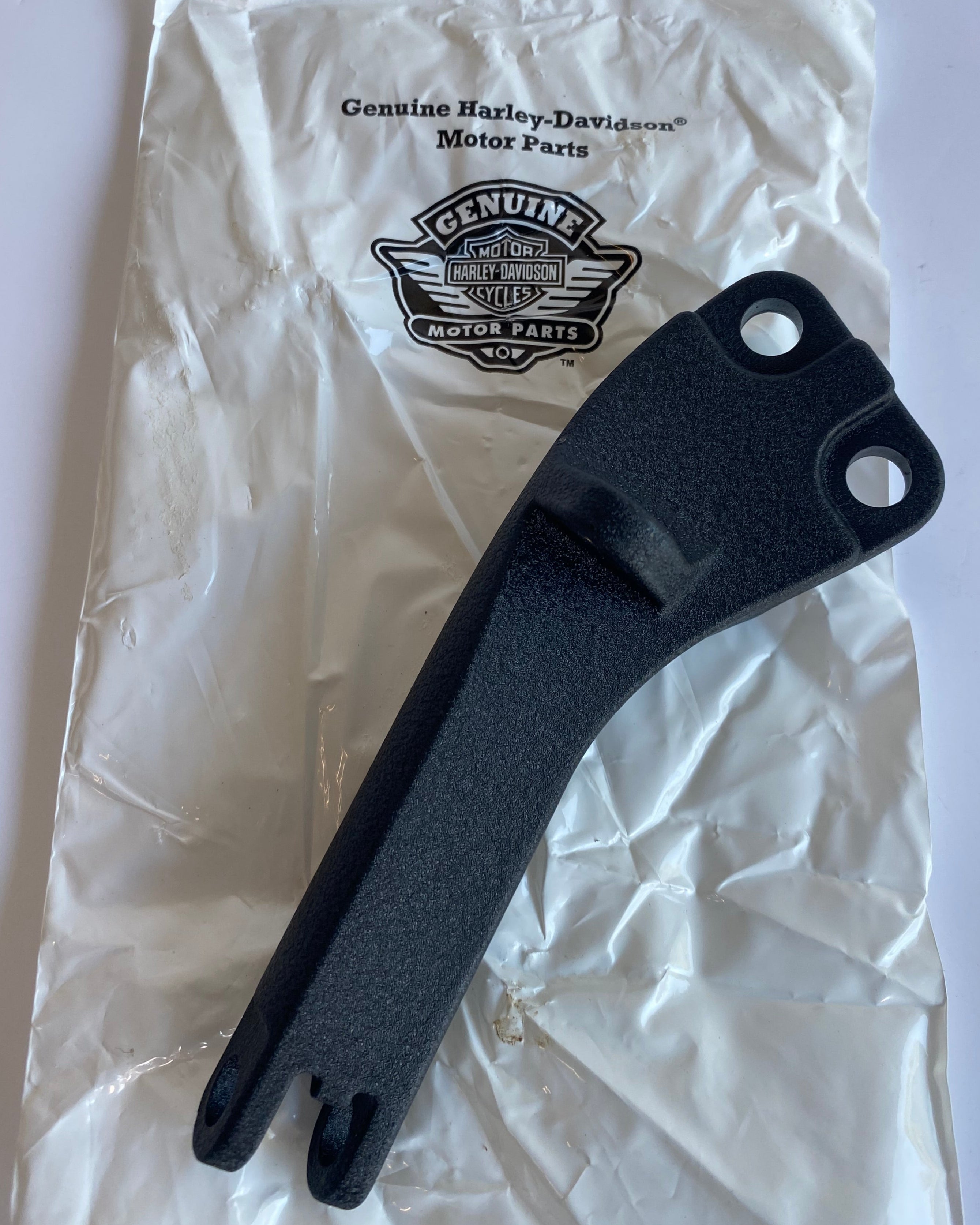 Support de cale pied passager gauche Dyna Harley Davidson REF OEM 49230-06