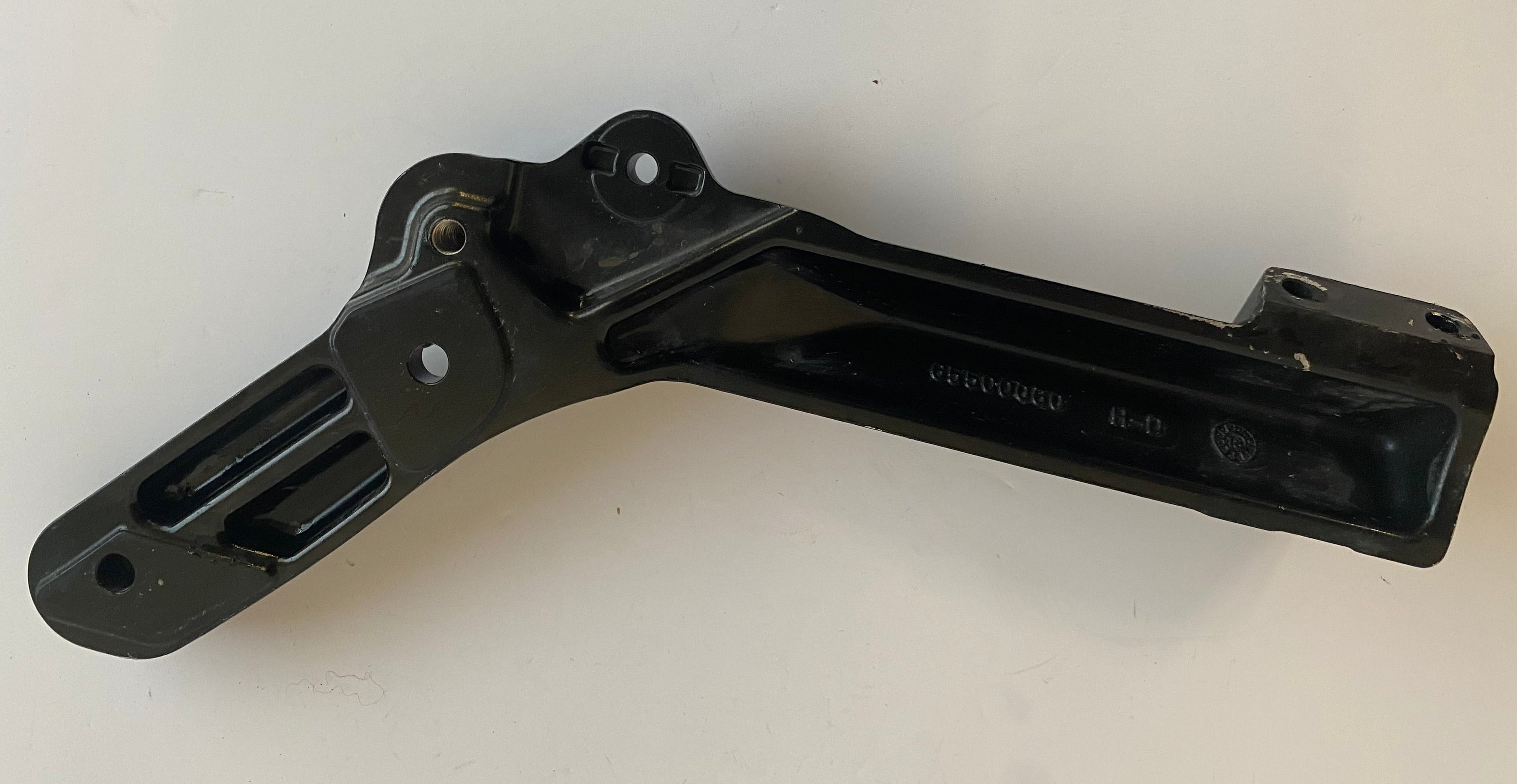 Patte de fixation silencieux échappement Softail Harley Davidson REF OEM 65500106