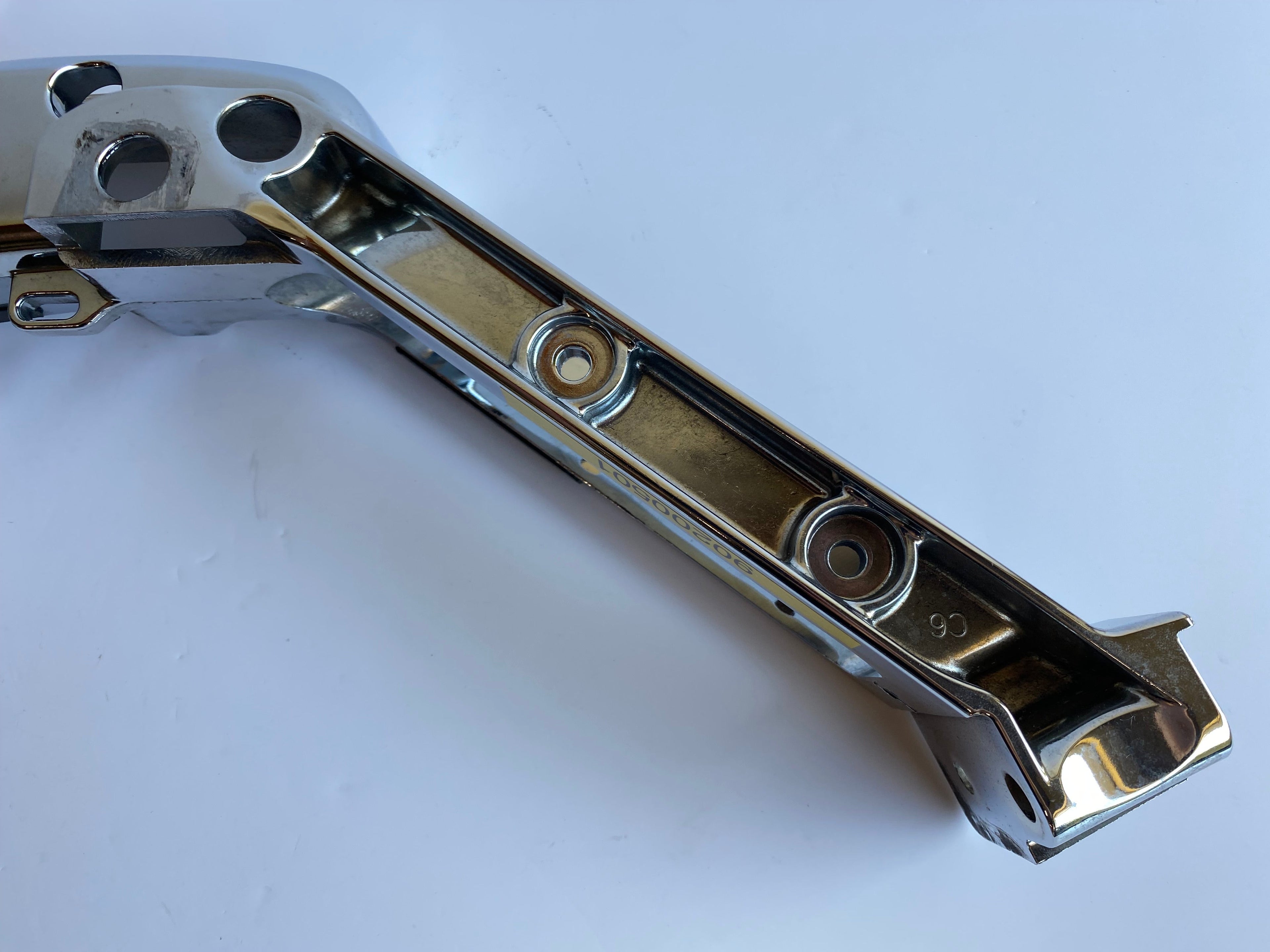 Support gauche sacoche/silencieux chromé Touring Harley Davidson REF OEM 90200501