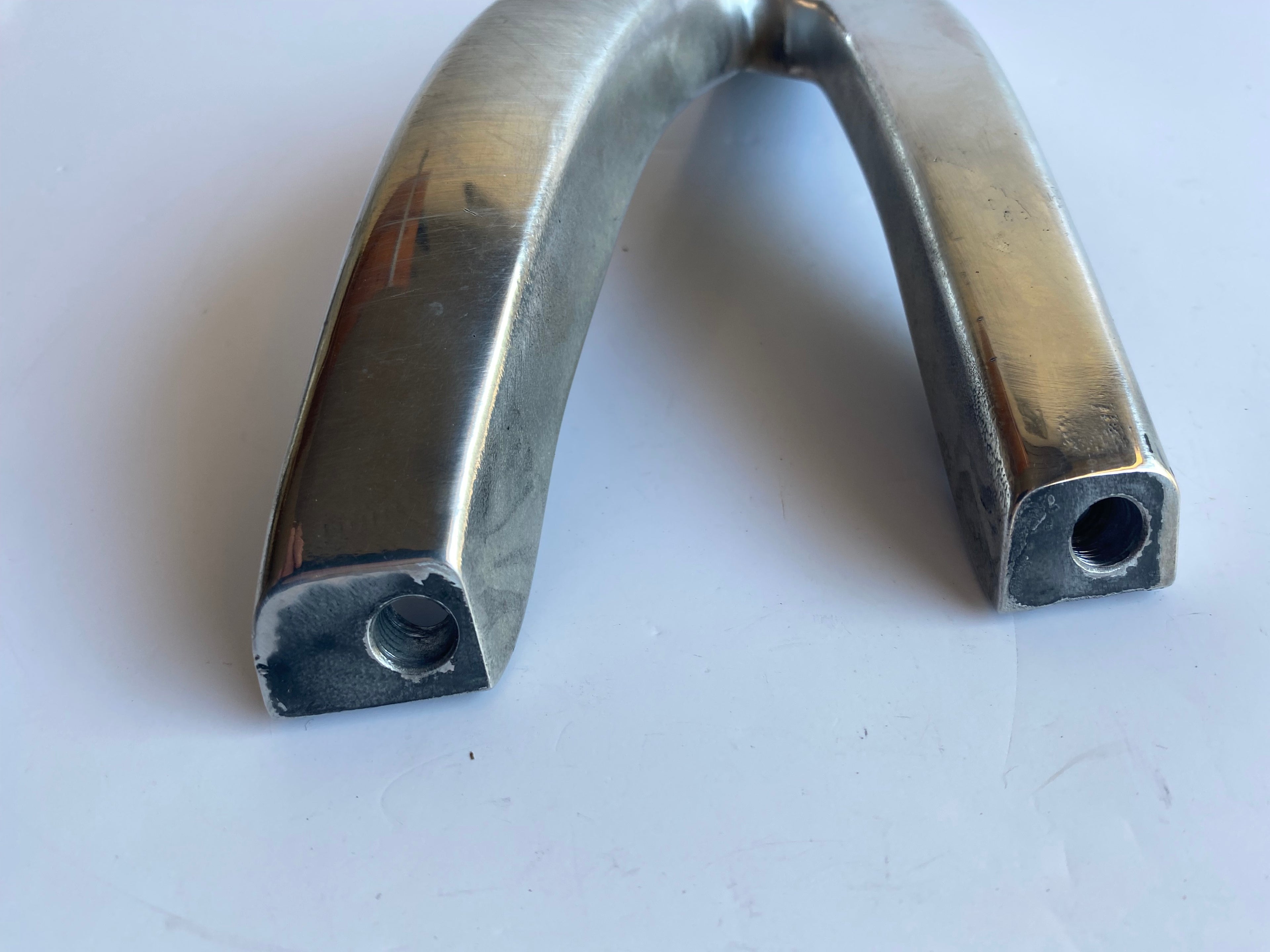 Support de repose pied gauche passager BUELL XB REF OEM : N0406.02A8