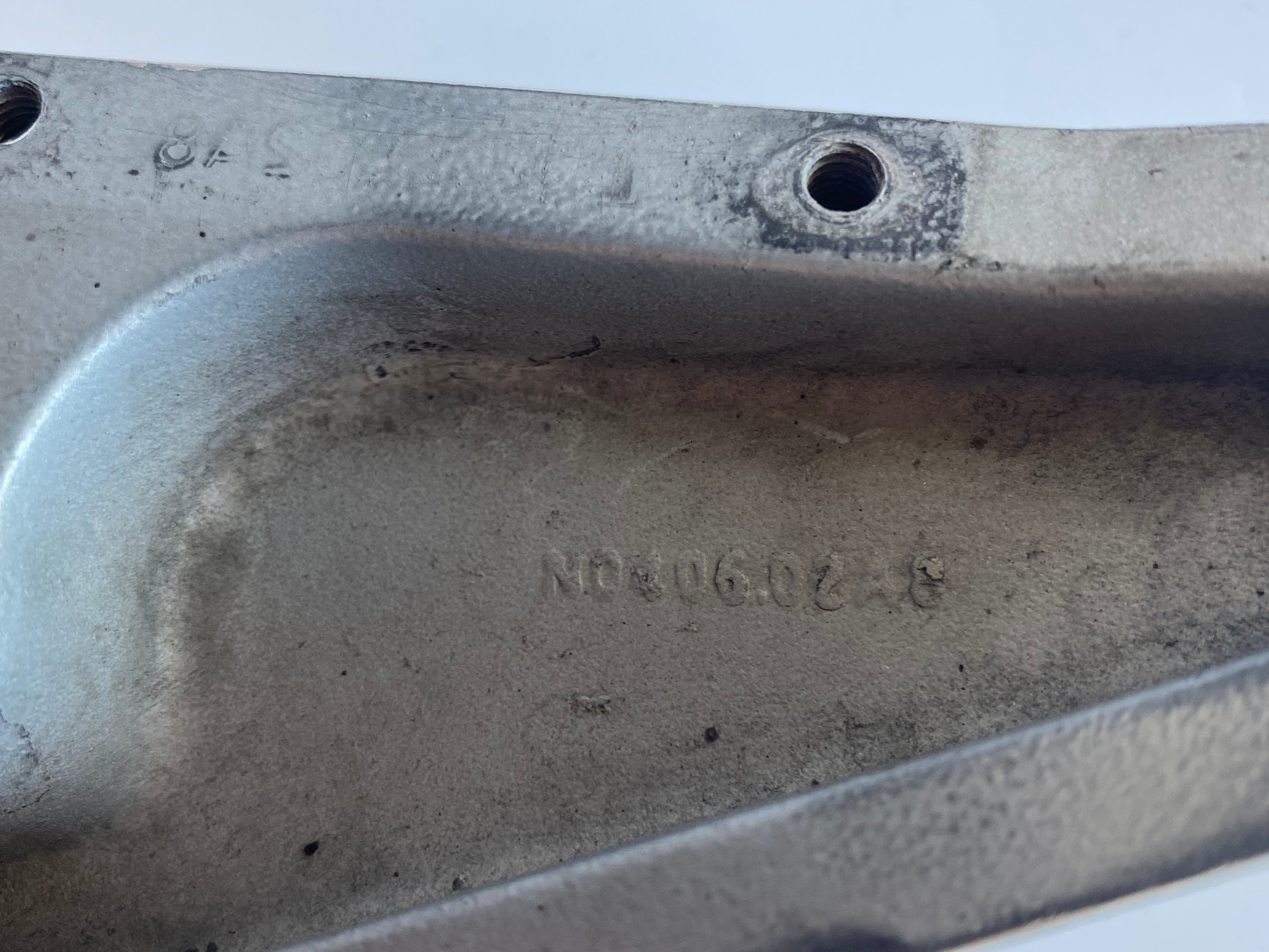 Support de repose pied gauche passager BUELL XB REF OEM : N0406.02A8