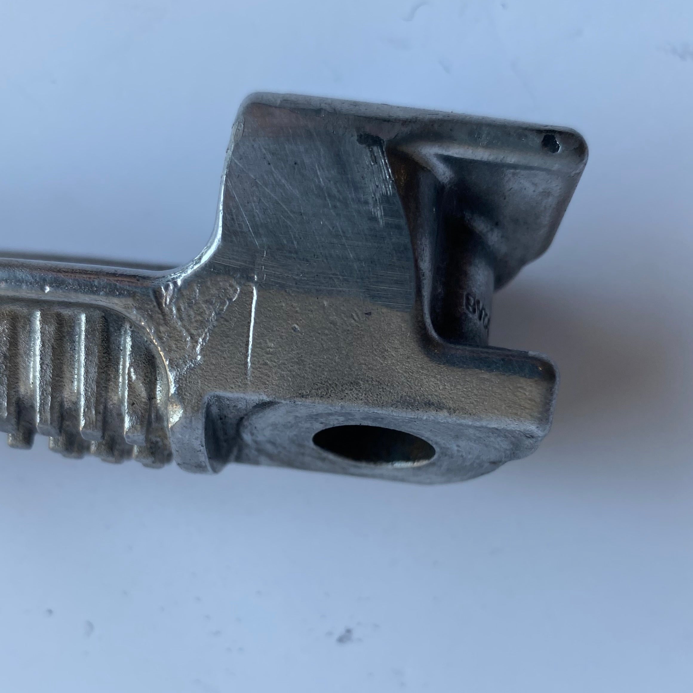 Cale pied passager gauche Buell XB REF OEM: N0552.02A8