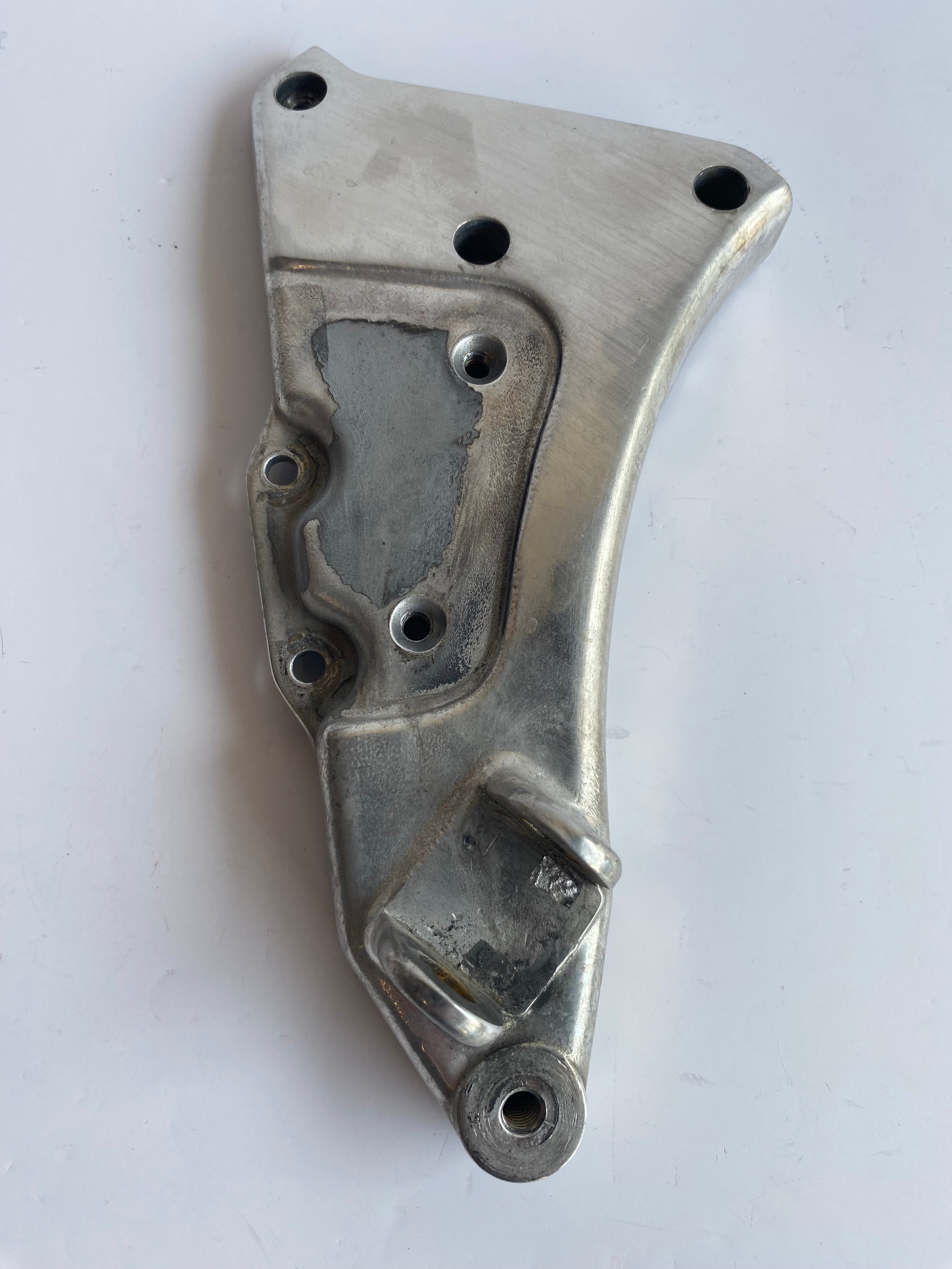 Support de cale pied pilote droit Buell XB REF OEM : N0401.02A8