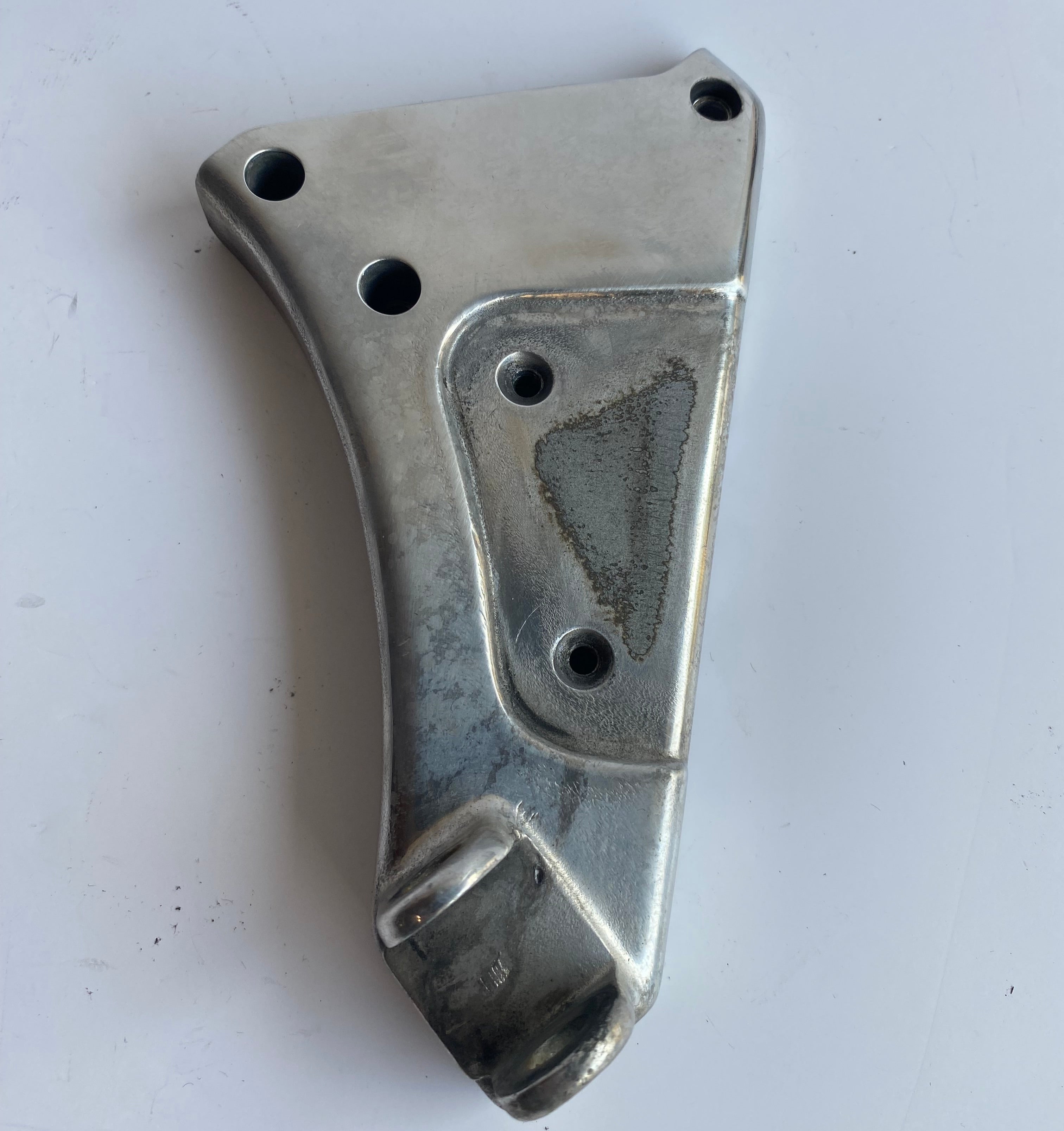 Support de cale pied pilote gauche Buell XB REF OEM : N0402.02A8