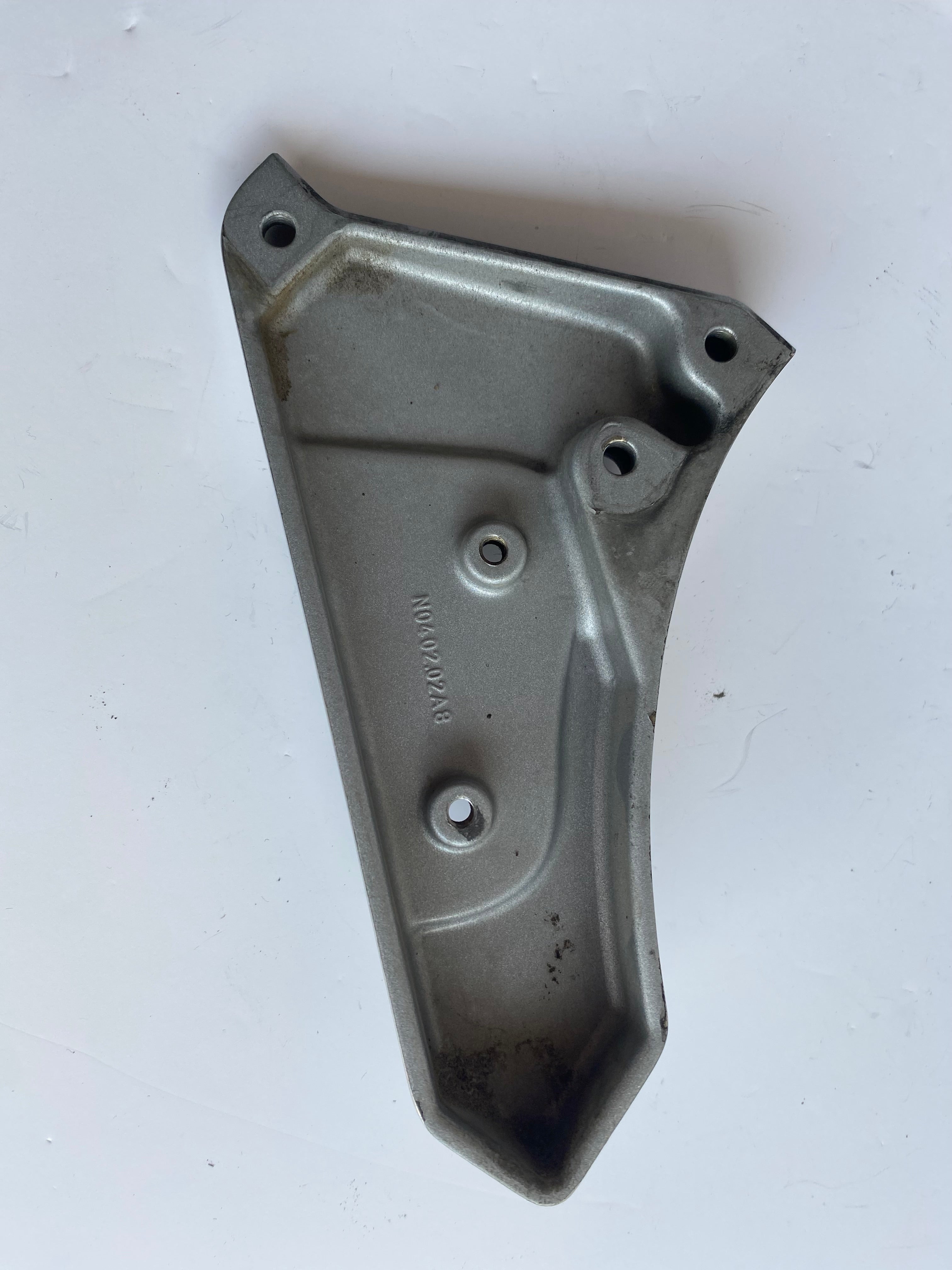 Support de cale pied pilote gauche Buell XB REF OEM : N0402.02A8