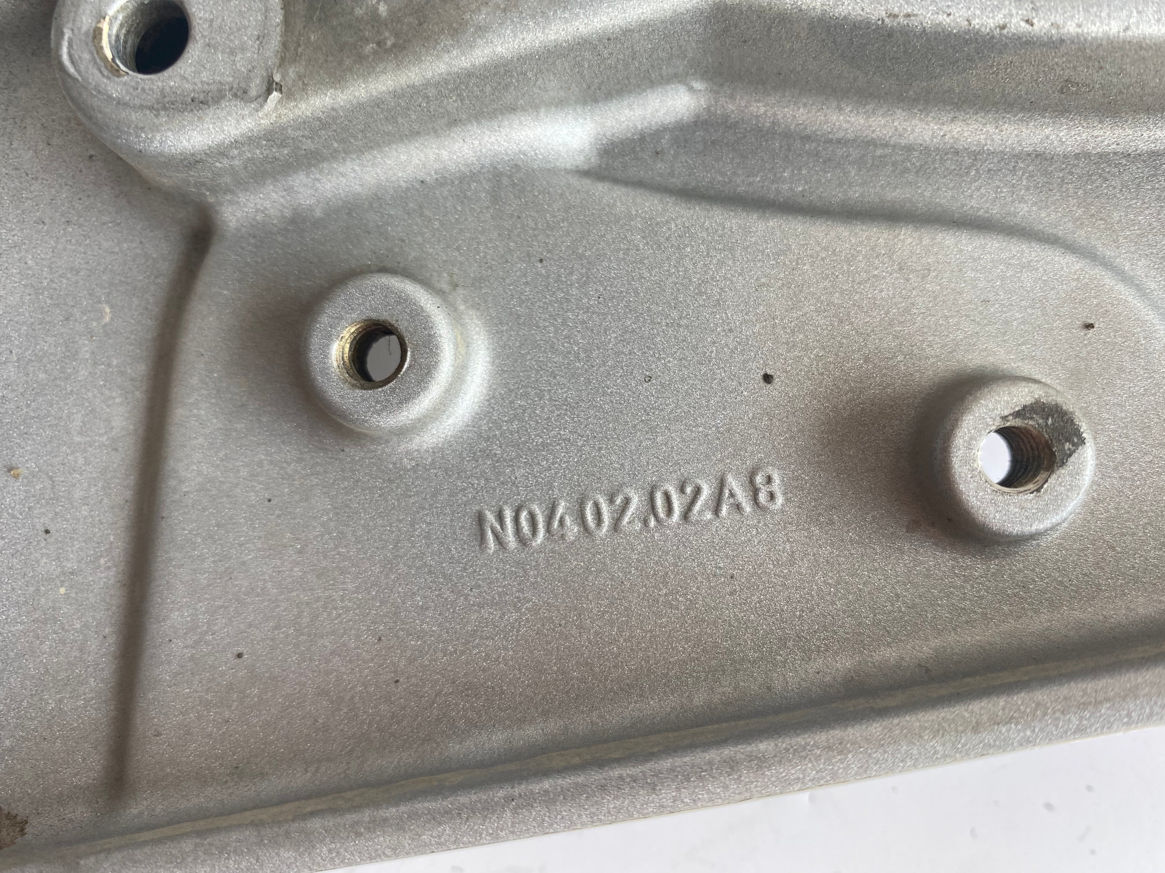 Support de cale pied pilote gauche Buell XB REF OEM : N0402.02A8