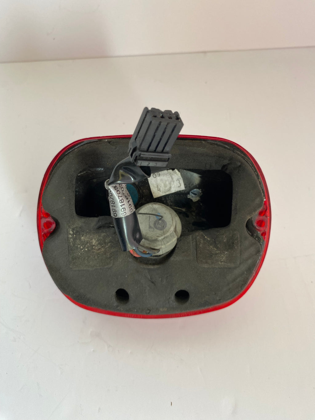 Cabochon de feu arrière Harley Davidson REF OEM : 68141-04