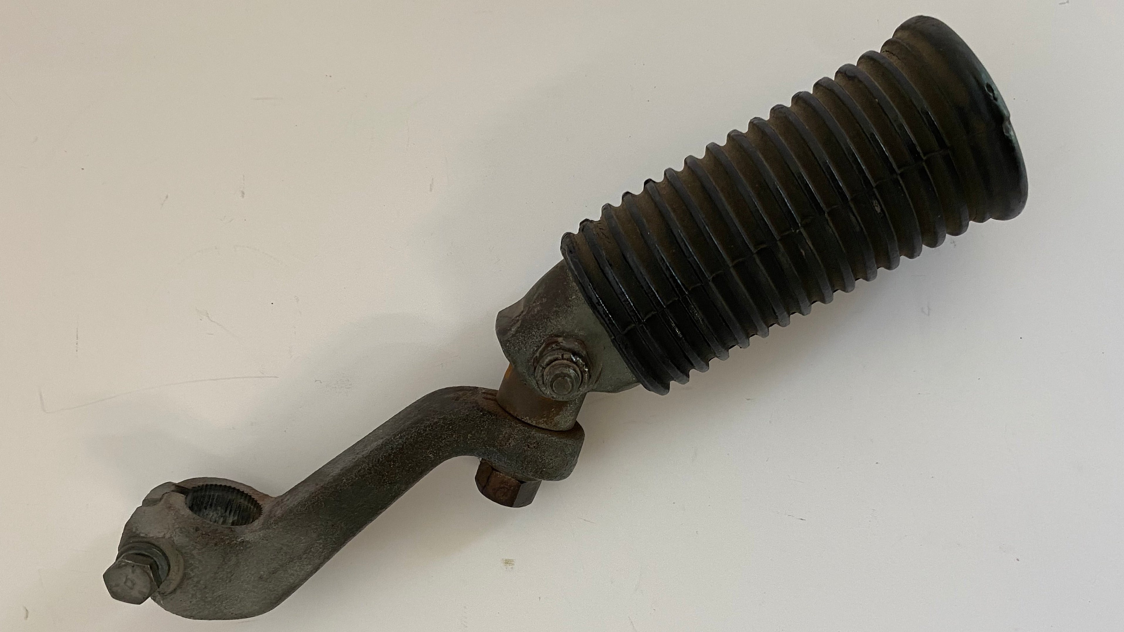 Support et cale pied pilote gauche Shovelhead Harley Davidson  REF OEM 52700-65
