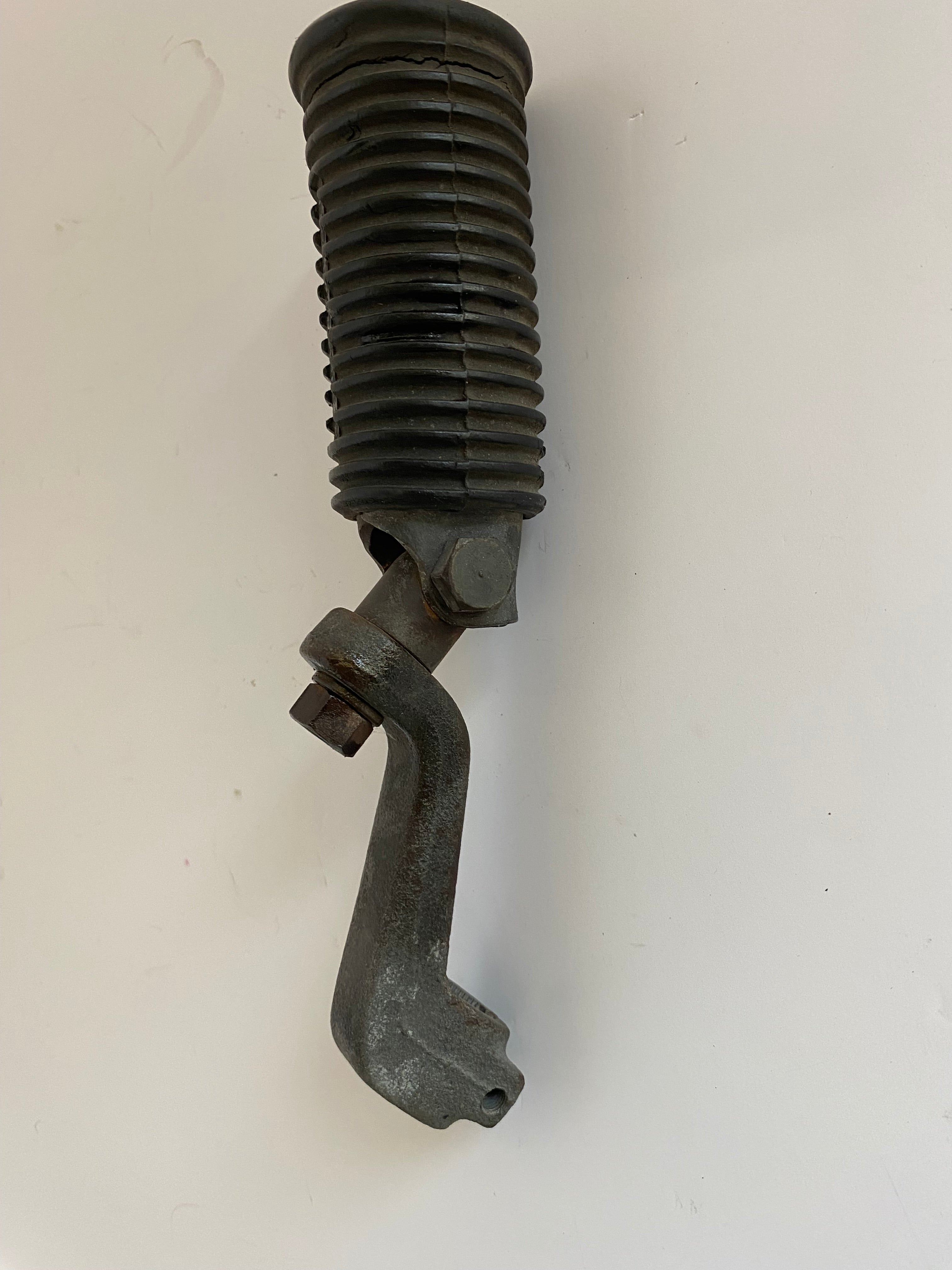 Support et cale pied pilote gauche Shovelhead Harley Davidson  REF OEM 52700-65