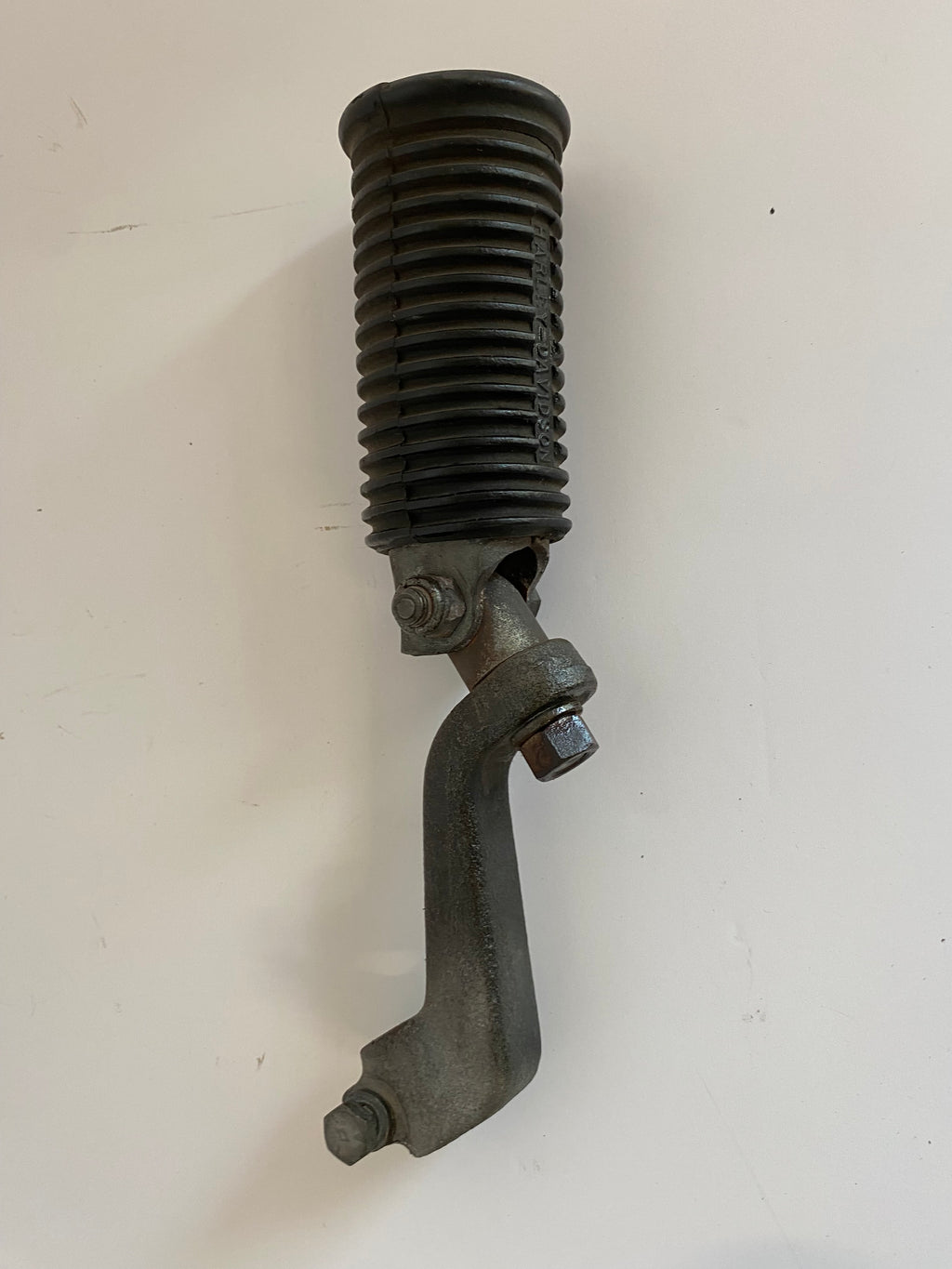 Support et cale pied pilote gauche Shovelhead Harley Davidson  REF OEM 52700-65