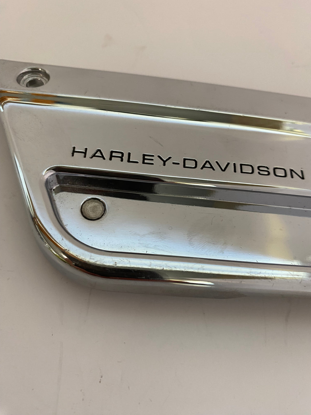 Harley Davidson left saddlebag hinge cover REF OEM: 90603-93A