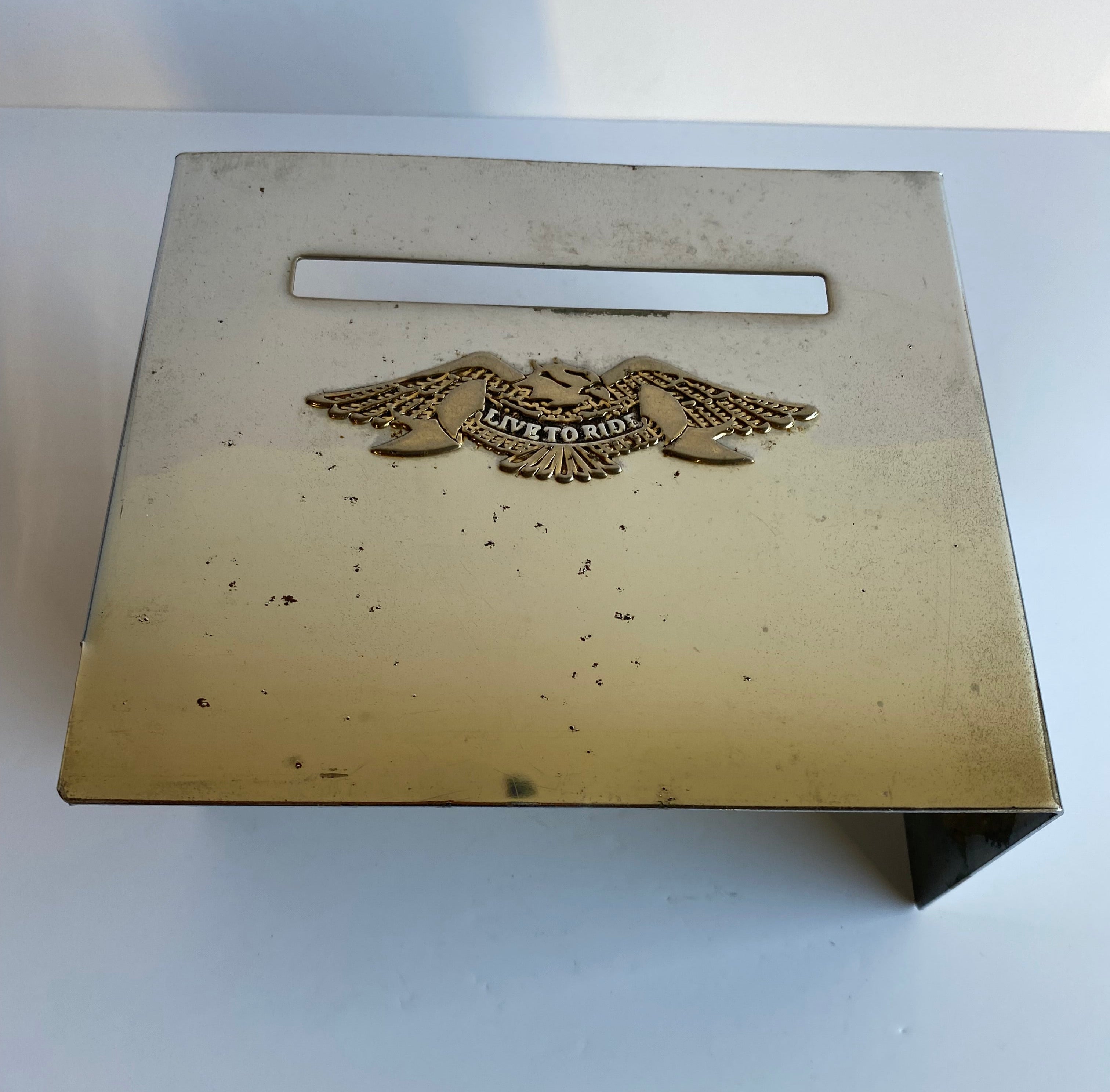 Cache batterie harley davidson LIVE TO RIDE REF OEM : 94862-83T / 66070-83T