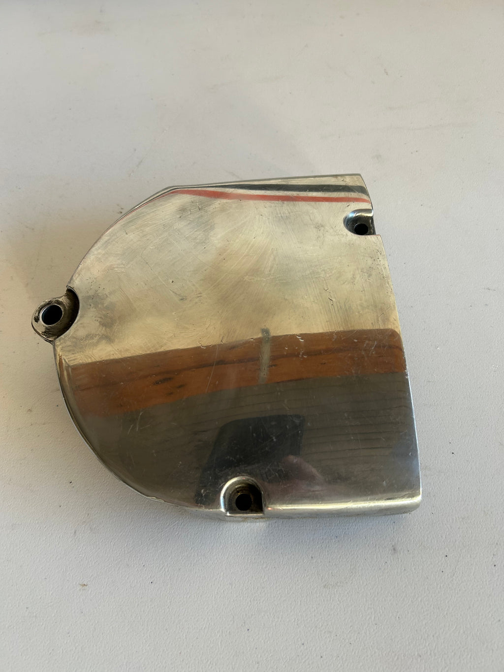 Couvercle pignon alu poli Harley Davidson REF OEM : 34911-04