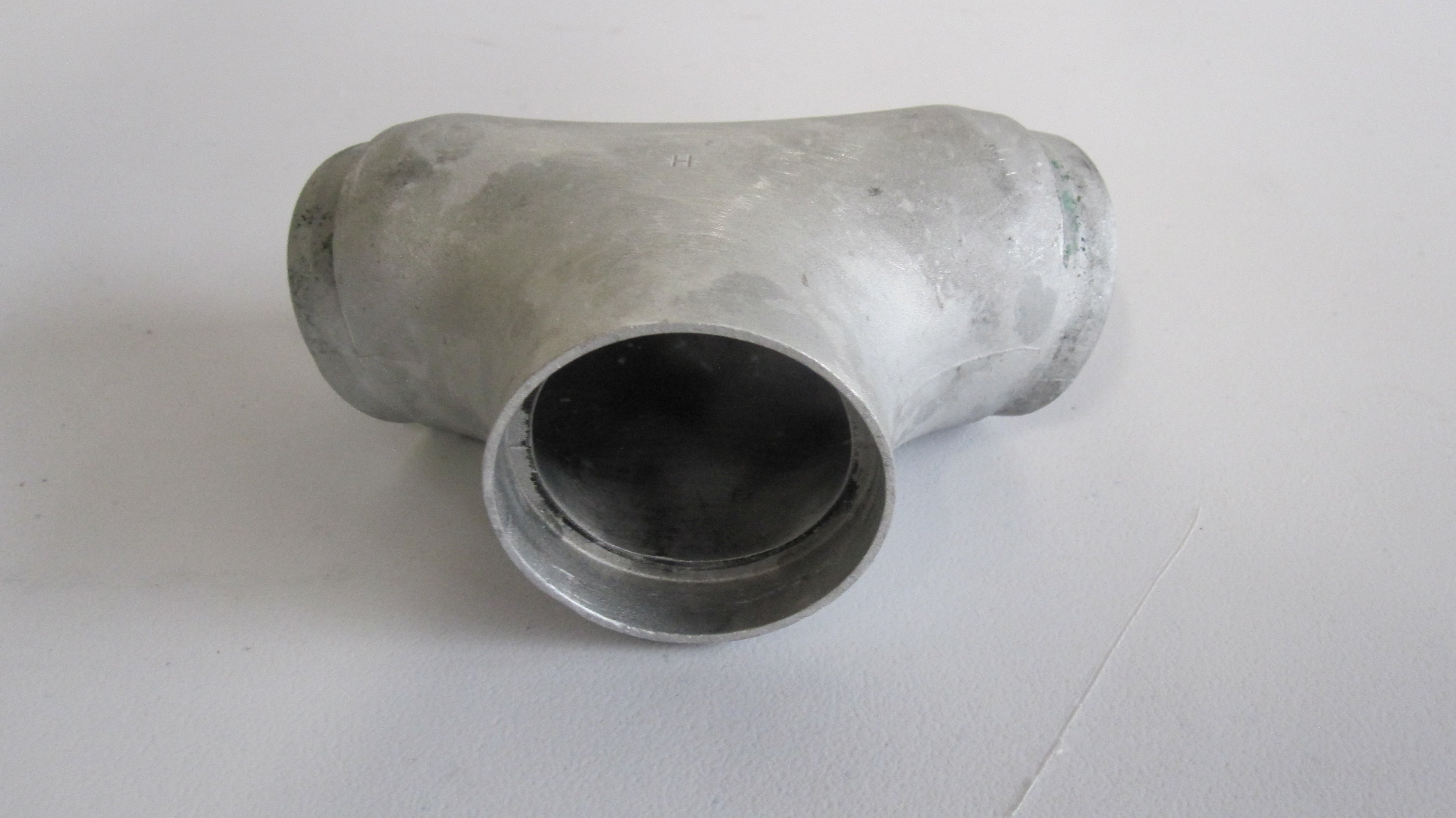 INTAKE PIPE Harley Davidson OEM REF: 26994-90