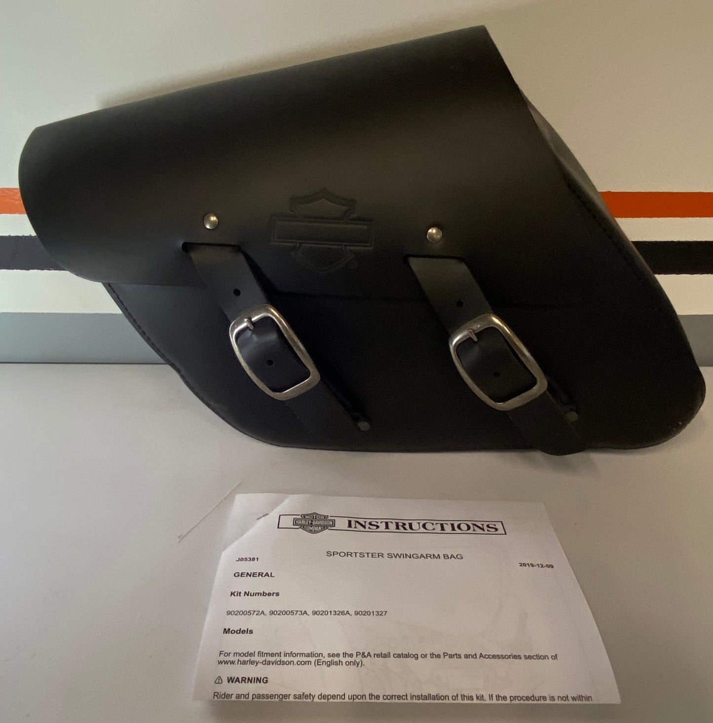 Sacoche latérale Sportster Harley Davidson REF OEM : 90201326A